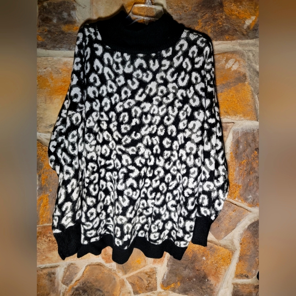 Cabana animal print black long sleeve sweater
